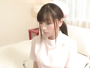 Adorable Japanese nurse gets excited hot from ass lick